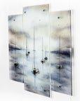 Fused glass staggered triptych featuring a hand-painted sailboat design in a soft and misty colour-way.