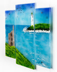 A fused glass triptych in coastal colours, with distant soaring sea birds, a lighthouse sat on a cliff and a Cornish tin mine. Hand-made coastal wall art, with texture.