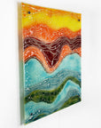 Side image of fused glass abstract, multi coloured square wall panel.