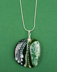 Fused glass pendant necklace, handmade in spring greens, with botanical hand-painted design.