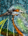 Close up of details on a round fused glass wall panel, with hand-painted kingfisher design in vibrant organic colours and textures.