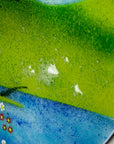 Close up of a bubble on a fused glass round panel, inspired by the Nearly Home Trees in Devon, designed in bright summer greens.