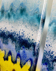 Details of a fused glass small triptych wall art piece, handmade in coastal, soft, organic colours, inspired by the Cornish beaches.