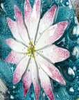 Details of a water lily on A fused glass round panel featuring hand-painted koi carp design with marine blue bubbled background.