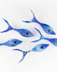 Small fused glass shoal of fish, handmade in coastal blue colours with organic bubbled detailing.