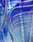 Close up of fused glass large vase handmade in Cornish studio in coastal blue colours. Stunning homeware piece of sculptural glass.