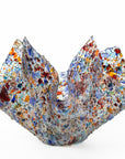 fold form fused glass vase in multi colours and textured detail.