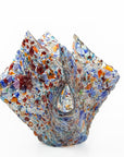 A fold form fused glass vase, handmade using recycled glass in vibrant colours.
