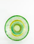 Fused glass round dish featuring a soft sea green colour-way with organic detailing.