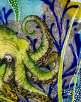 Close up image of a fused glass round wall panel with a green octopus design, hand-painted with organic, textured detail. An ocean reef inspired piece of wall art.