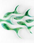 Fused glass shoal of fish in a sea green and aqua colour-way.