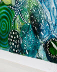 Close up of intricate ocean reef inspired fused glass art frame. A vibrant and handmade piece of wall art.