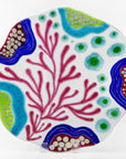 Fused glass round dish, with hand painted design inspired by the ocean reefs in bright colours.