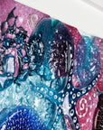 Detailing in fused glass art frame inspired by the ocean, created with texture and coastal colours with pink hues. A unique piece of wall art, handmade in Cornwall, Launceston.