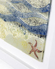Fused glass large art frame inspired by a sunrise on the coast. Handmade wall art with textural detailing.