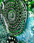 Details of a fused glass wall panel, with organic hand-painted designs and ocean colours.