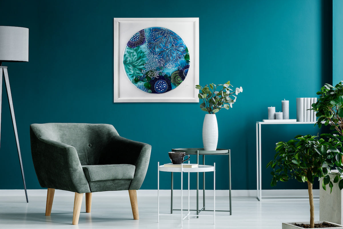 Signature art frame reflecting bold teal interior colour palette