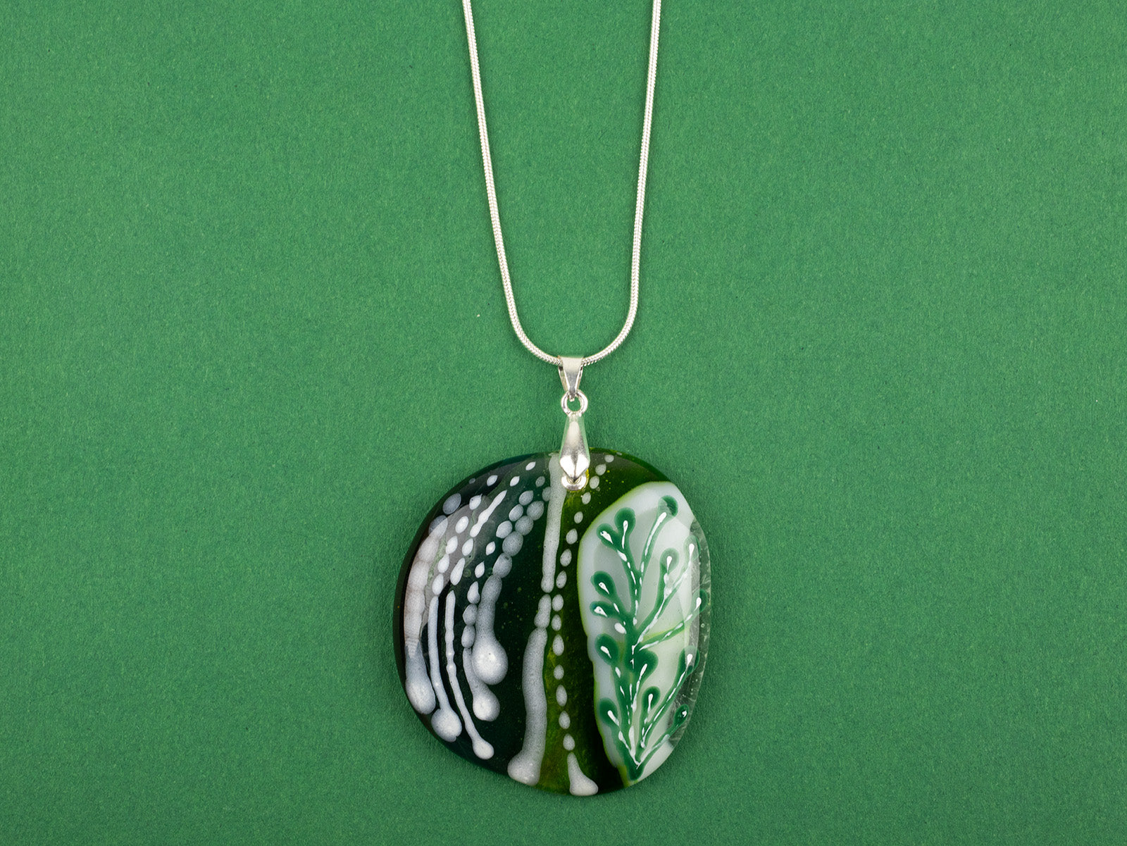 Fused glass pendant necklace, handmade in spring greens, with botanical hand-painted design. 