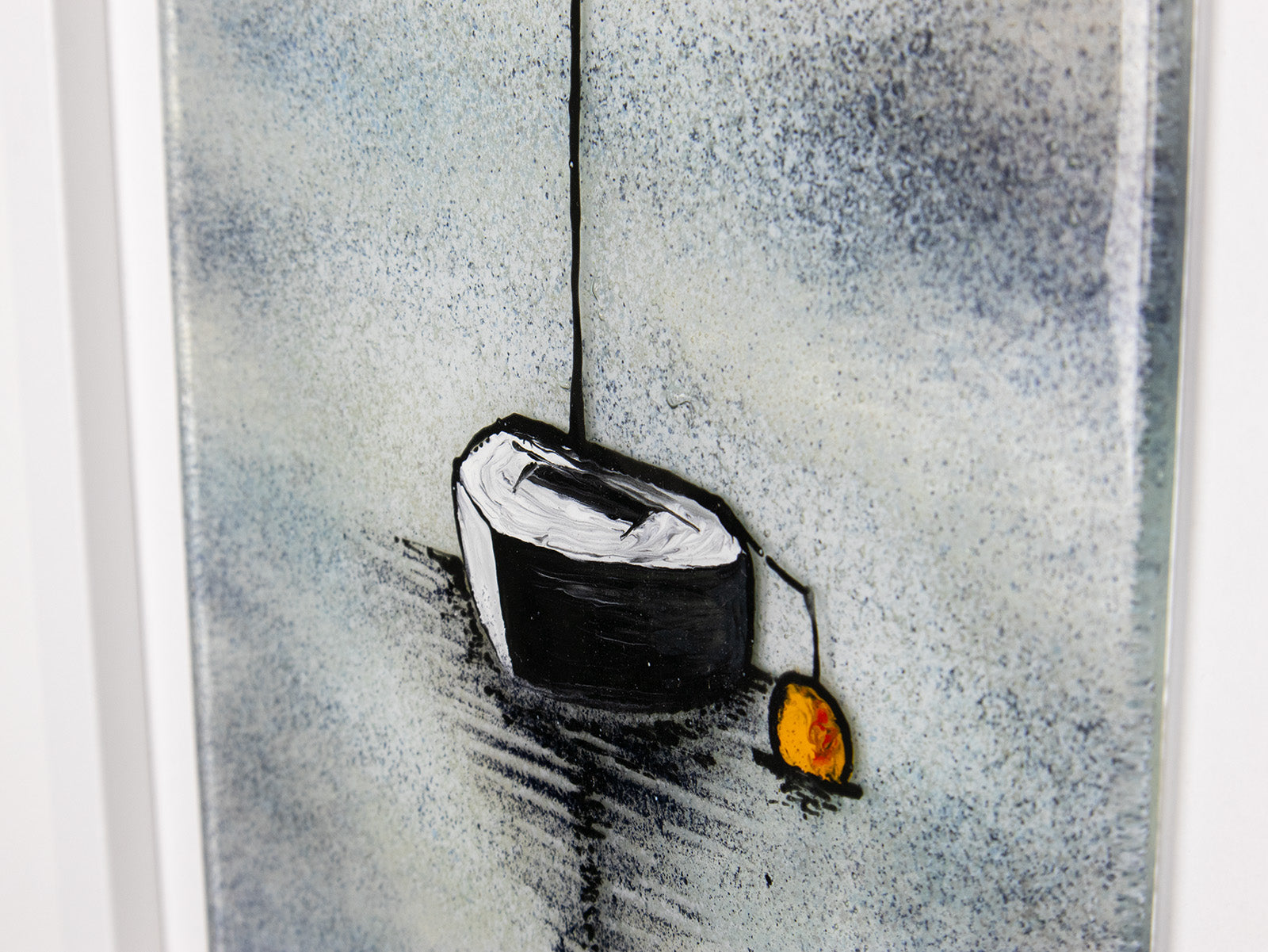 Painted detailing on a fused glass oblong art frame with hand-painted sailboat design in a soft coastal colour-way. 