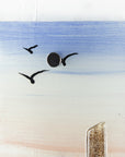 Close up of soaring birds as a silhouette on a fused glass extra small wall panel, featuring soft sunset sky, coastal landscape and a Cornish tin mine. 