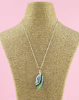 Fused glass pendant necklace in soft green and pink hues Handmade in organic colours and presented on a sterling silver chain. 