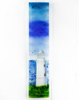 Fused glass wall panel with lighthouse design and soaring seagulls. Handmade made in Cornish studio in coastal colours.