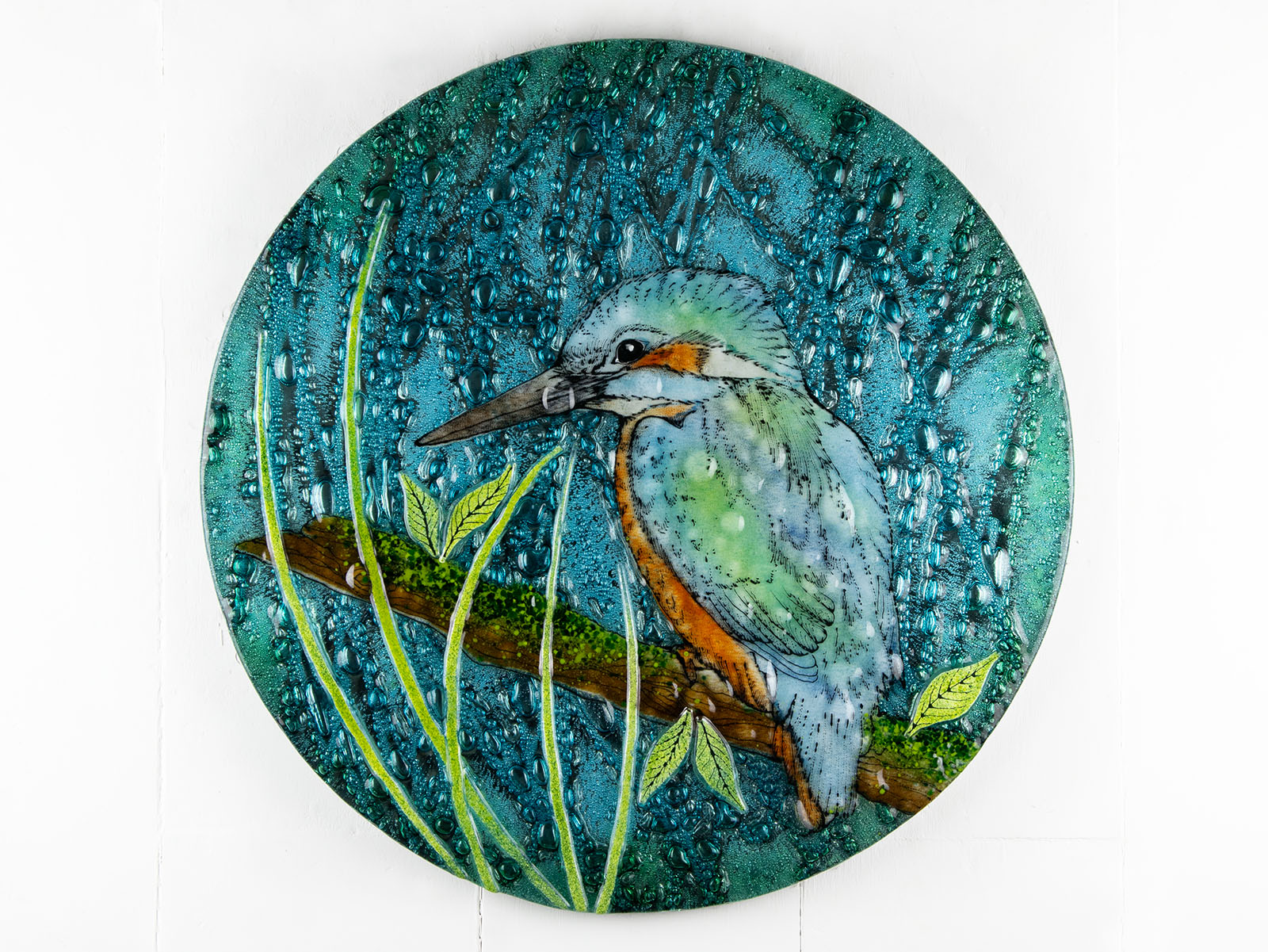 Round fused glass wall panel, with hand-painted kingfisher design in vibrant organic colours and textures. 