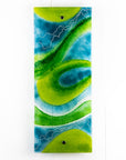 A fused glass wall panel in vibrant marine colours, in an abstract design. Hand-made in our Cornish studio. 