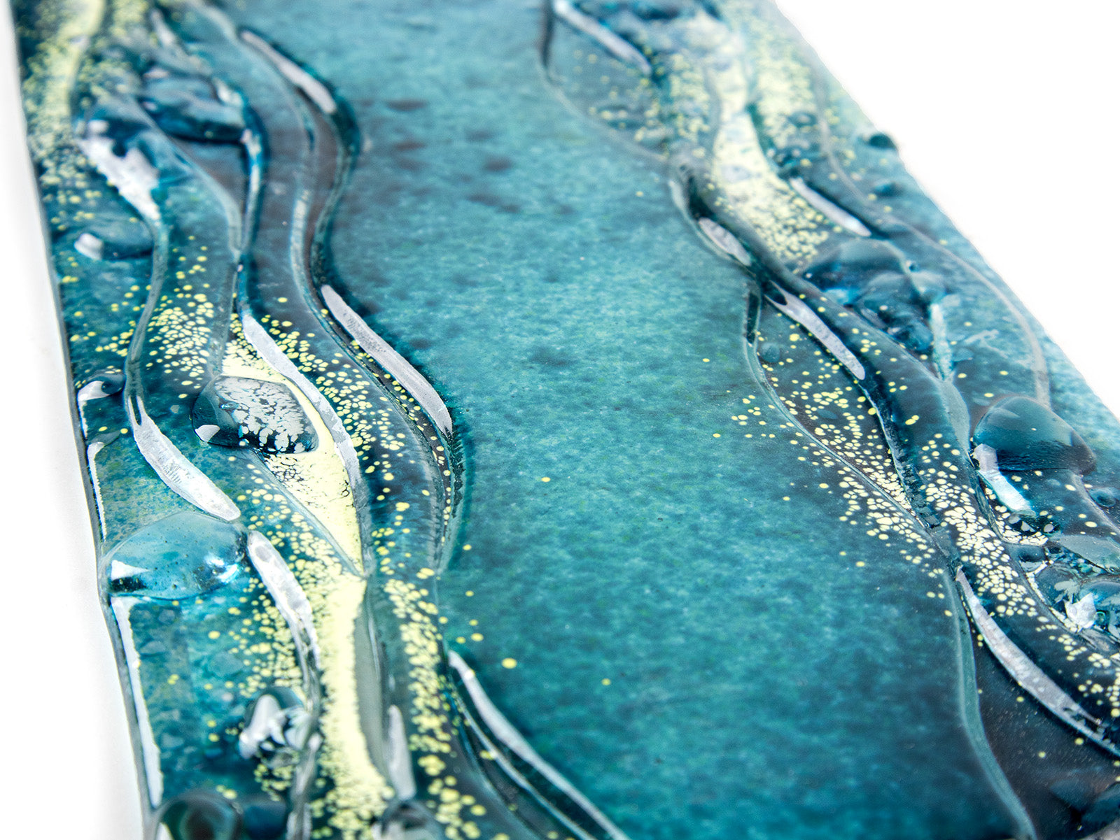 Close-up fused glass candlestand with tea lights textured blue teal giftware tableware