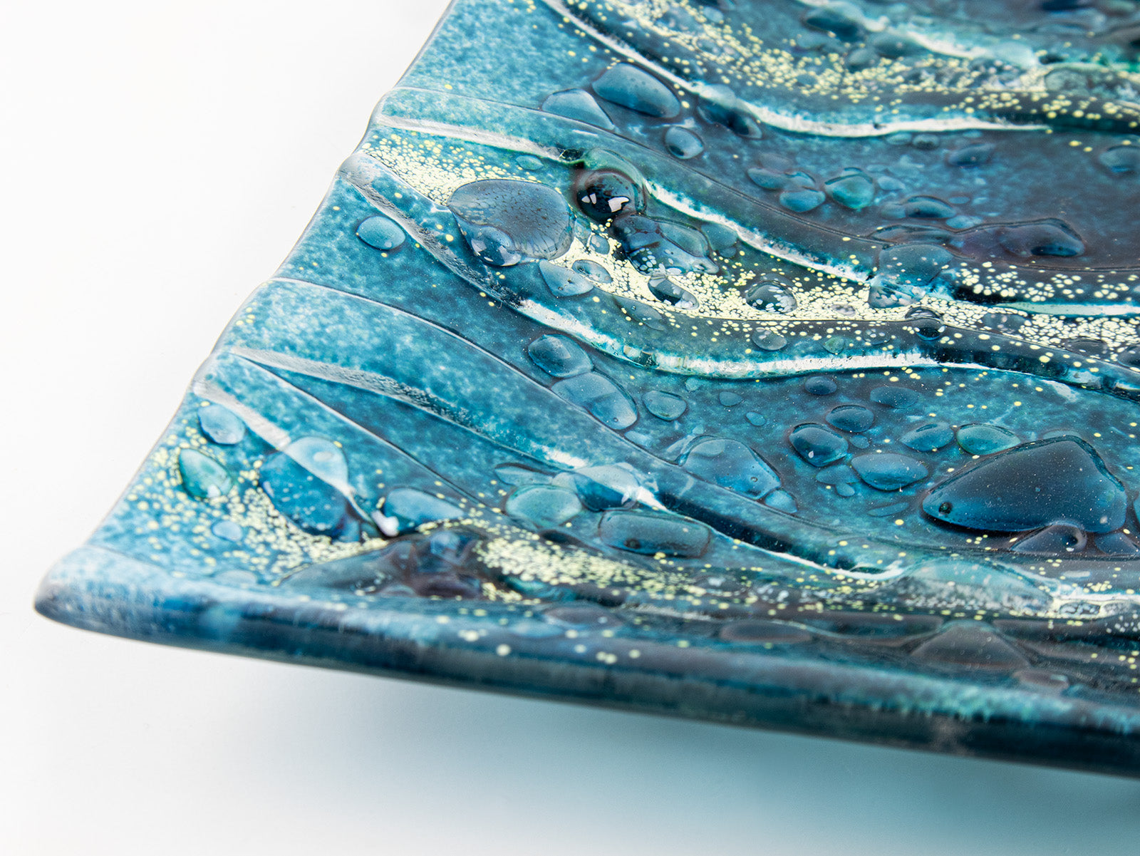 close-up fused glass square bowl textured blue teal 