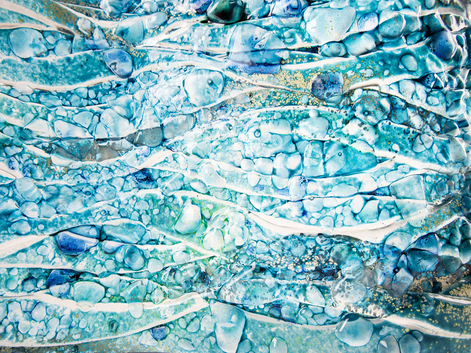 detail of texture and colour blue teal fused glass