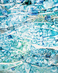 detail of texture and colour blue teal fused glass