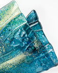 close-up fold form fused glass blue teal textured detail