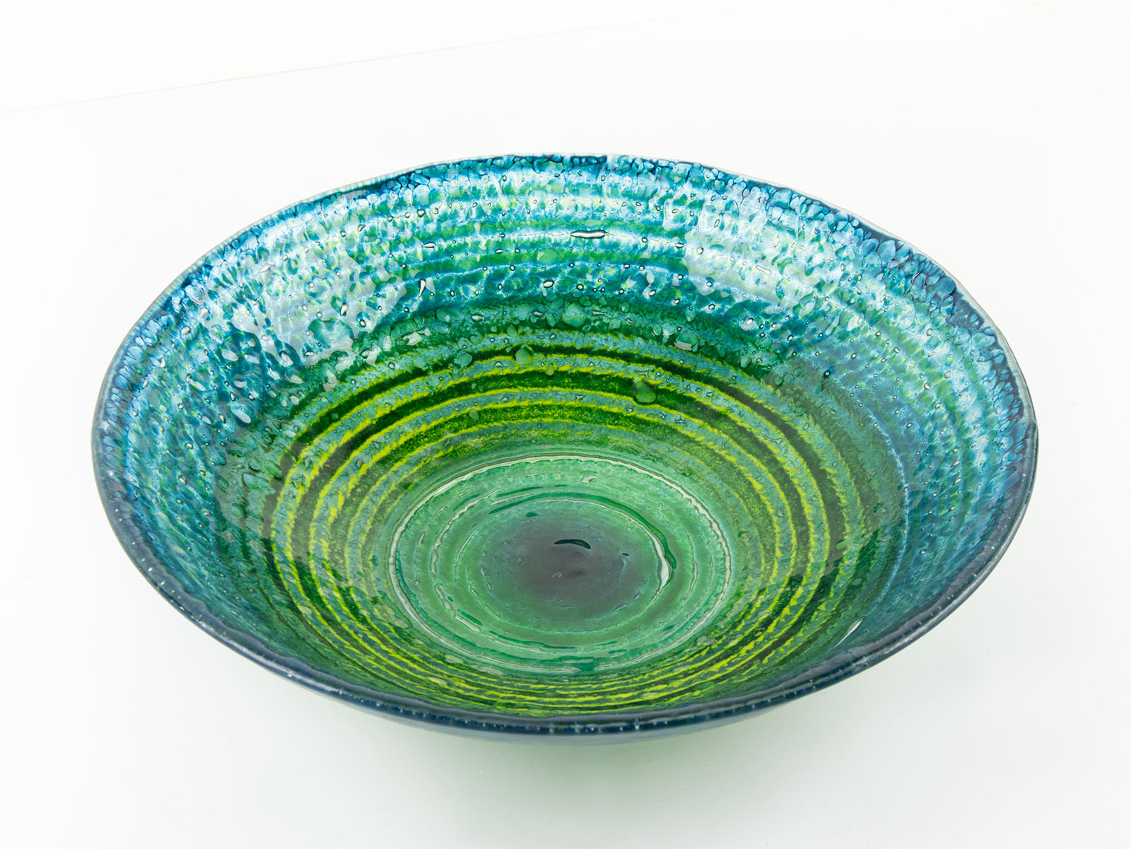 Fused glass extra large dish made with ocean teals and greens with glass texture. Handmade in Cornwall, Launceston. 