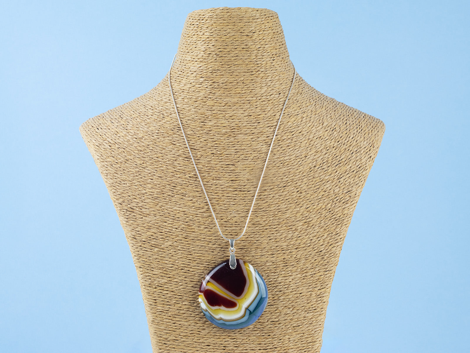 Fused glass extra large pendant necklace, handmade in ruby reds and marine blues. Stunning jewellery with sterling silver chain. 