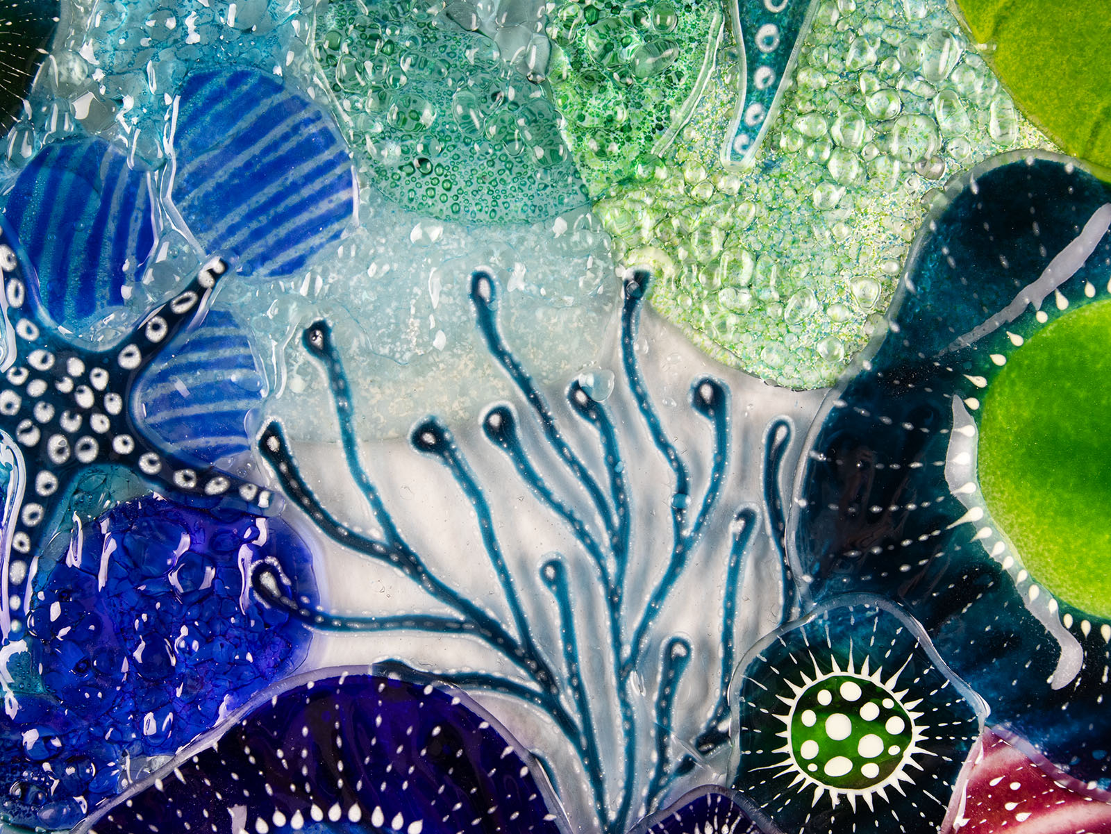 Organic depth captured on Fused glass art frame, in vibrant coastal colours, inspired by the ocean reefs with organic detailing. 