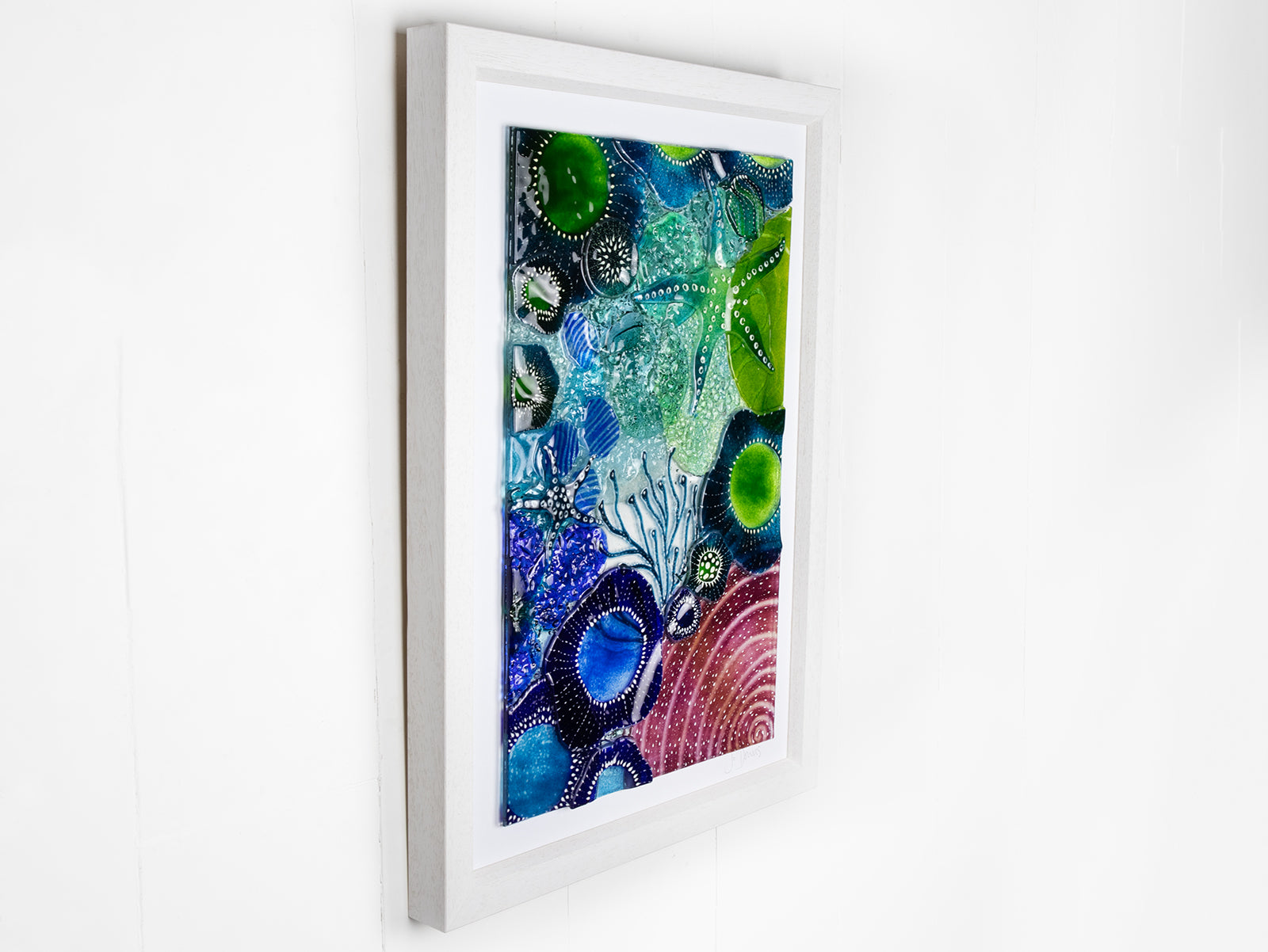 Fused glass art frame, in vibrant coastal colours, inspired by the ocean reefs with organic detailing. 