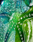 Starfish close up on a fused glass art frame, in vibrant coastal colours, inspired by the ocean reefs with organic detailing. 