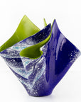 Opaque ocean inspired fused glass fold form vase with bright coastal colours and texture. 