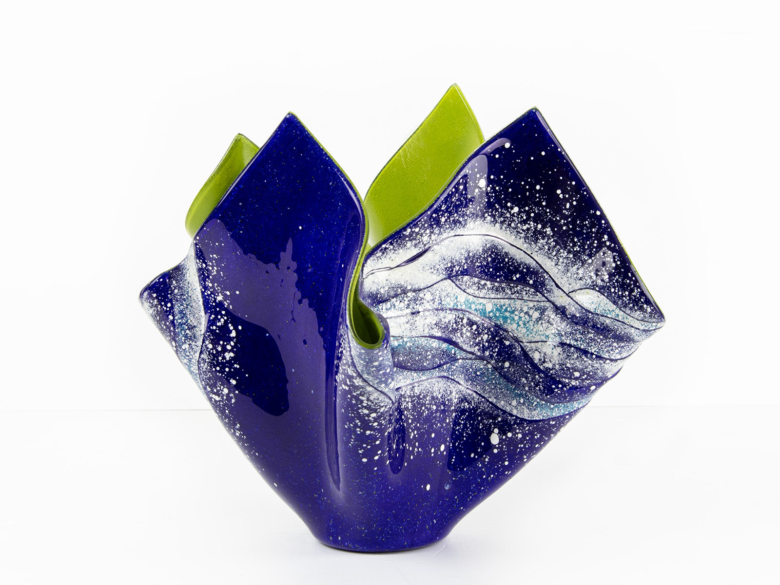 Opaque ocean inspired fused glass fold form vase with bright coastal colours and texture. 