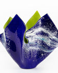 Opaque ocean inspired fused glass fold form vase with bright coastal colours and texture. 