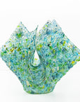 Side image of fused glass large vase, handmade from recycled glass in ocean green and blue hues. 