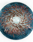 Fused glass round panel with copper fish detail and a ocean teal colour-way.