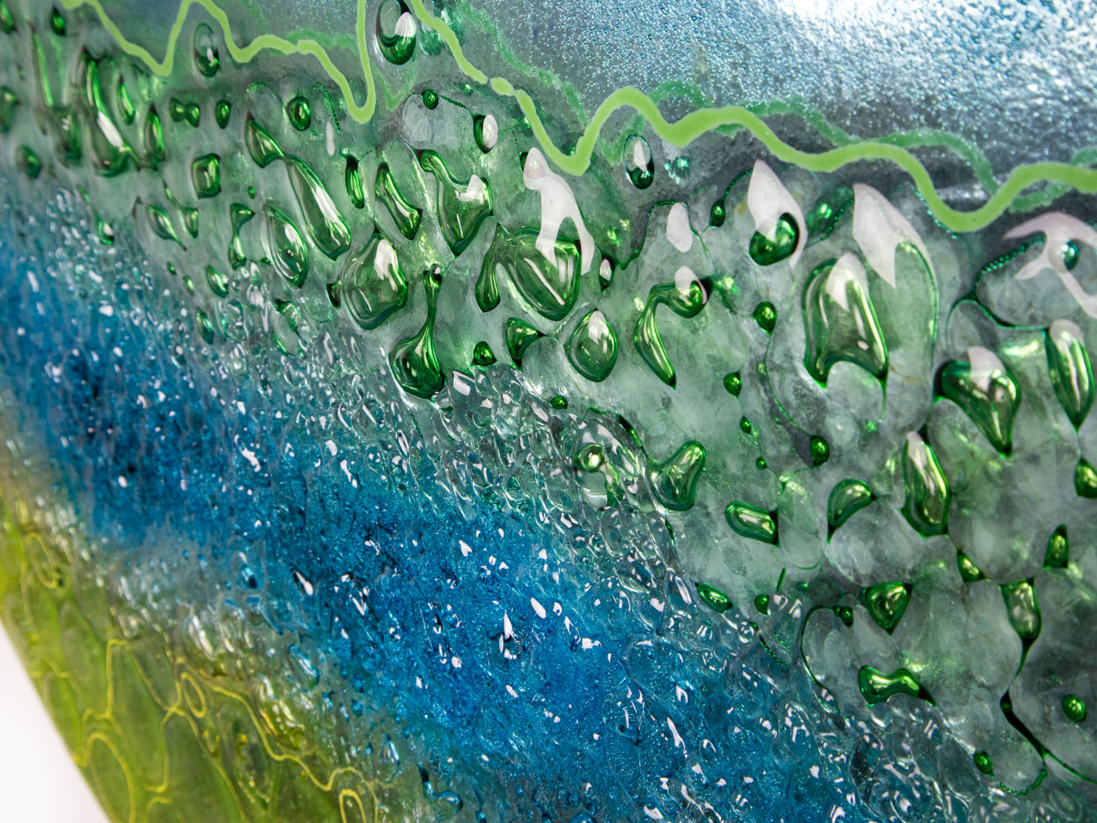 Details of abstract round panel inspired by the ocean with textured detail. 