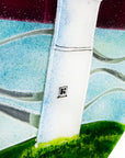 Details of a lighthouse on a fused glass round panel. 