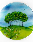 Fused glass round panel, inspired by the Nearly Home Trees in Devon, designed in bright summer greens. 