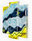 Fused glass triptych inspired by the ocean with starfish detailing and coastal colours. 