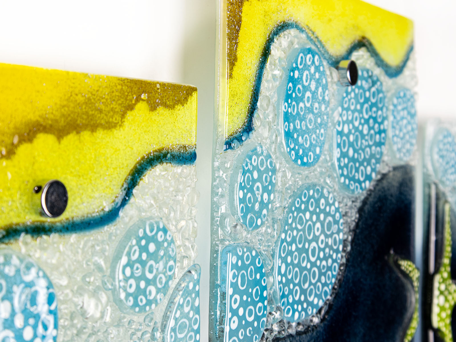 Fused glass triptych inspired by the ocean with starfish detailing and coastal colours. 