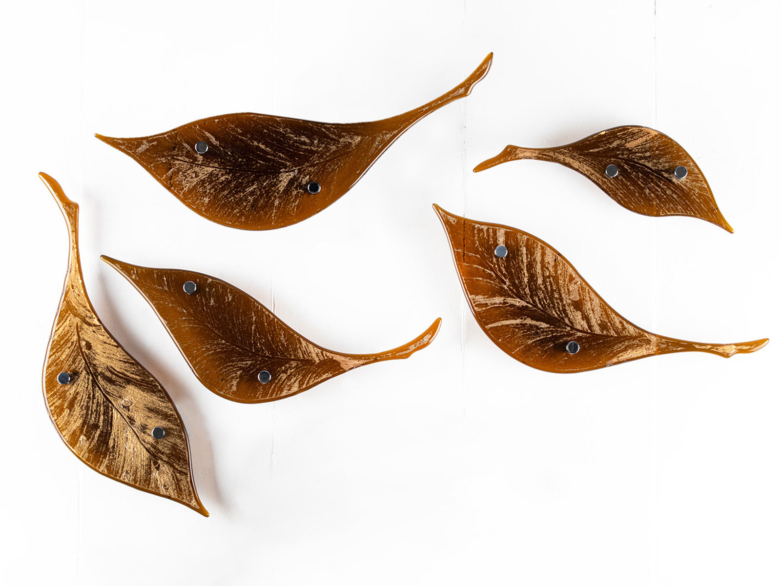 Fused glass drift of leaves as a gorgeous wall art display in autumn browns and golds. 