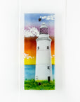 Handmade wall panel featuring a lighthouse with bright sunset colours. Gorgeous Artisan wall art piece, designed in Cornwall. 